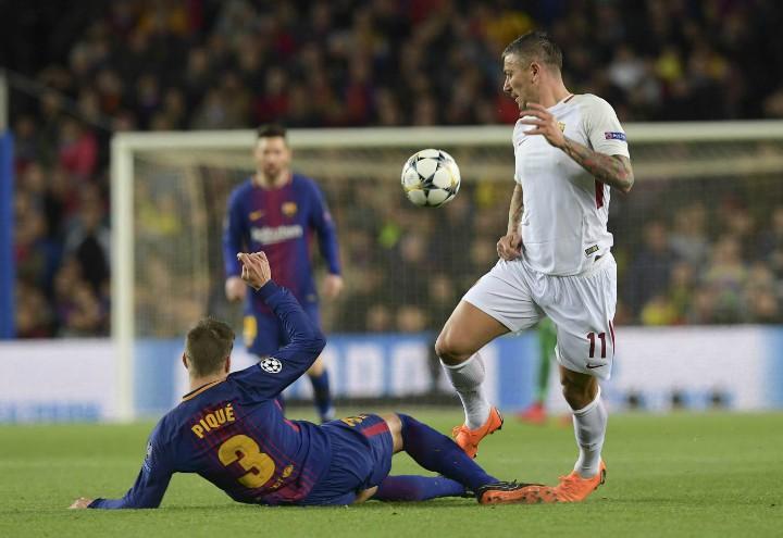 Kolarov_Pique_Barcellona_Roma_lapresse_2018
