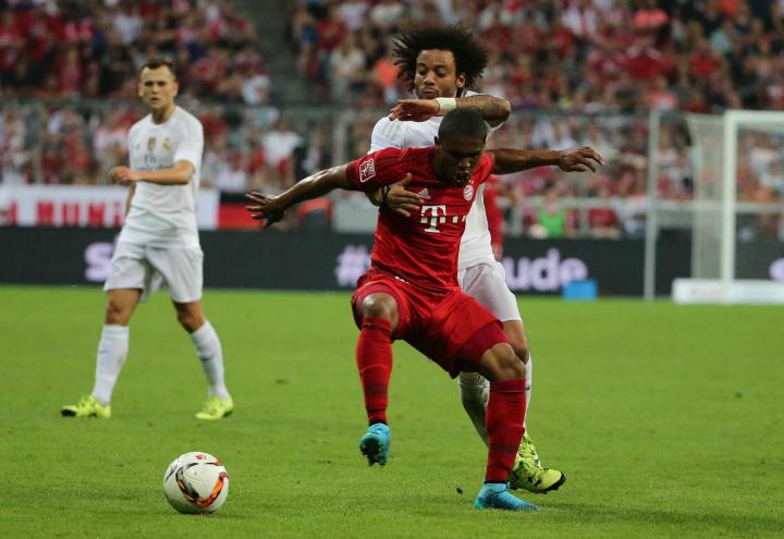 DouglasCosta_Marcelo_Bayern_Real_lapresse_2017