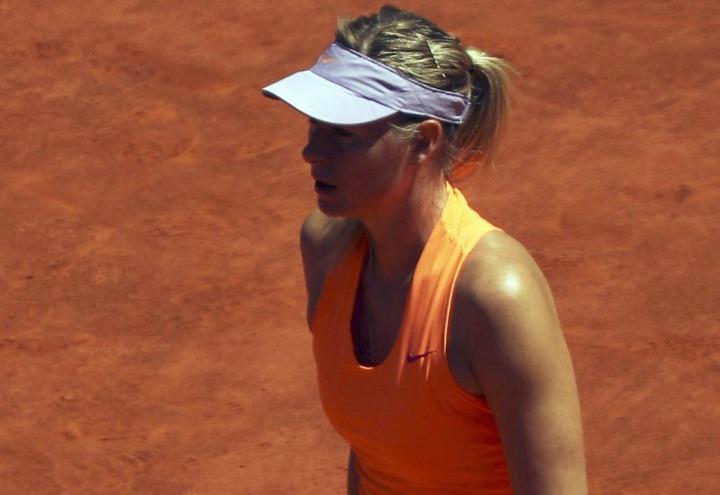 Sharapova_arancione_Madrid_lapresse_2017