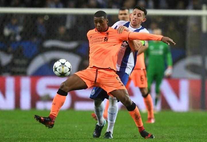 Wijnaldum_Herrera_Porto_Liverpool_lapresse_2018