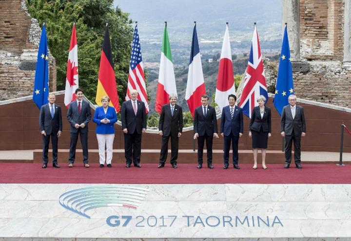 g7_taormina_bandiere_leader_trump_gentiloni_merkel_trudeau_abe_may_macron_lapresse_2017