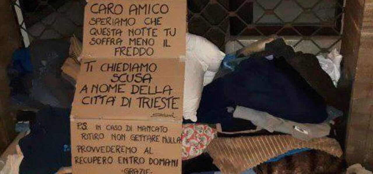 Coperte e maglioni al clochard