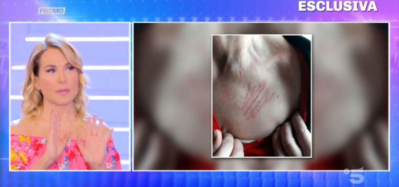 Difende posto auto del figlio disabile