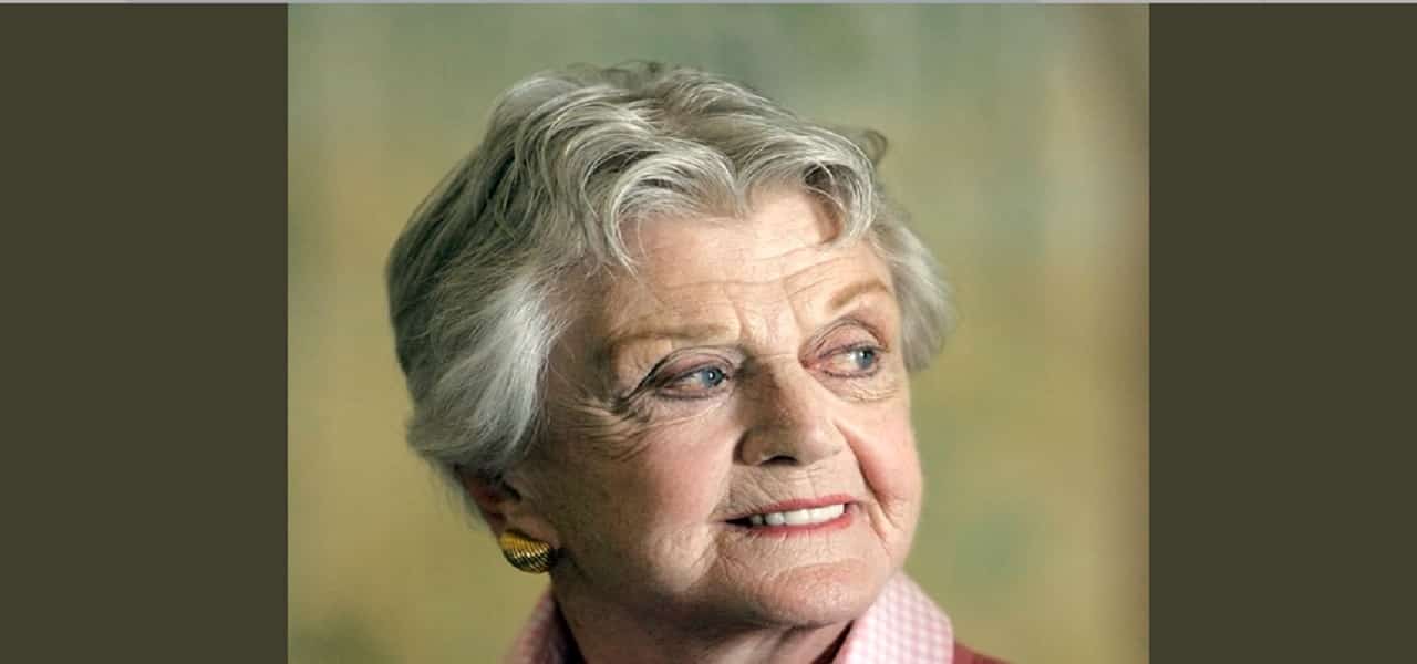 signora in giallo min